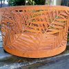 Squat round outdoor fire pit with "Kentia" pattern