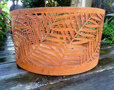Squat round firepit with "Kentia" pattern Squat round outdoor fire pit with "Kentia" pattern