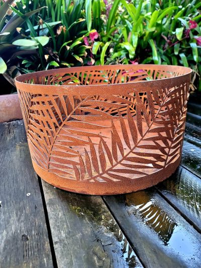Squat round firepit with "Kentia" pattern Squat round firepit with "Kentia" pattern