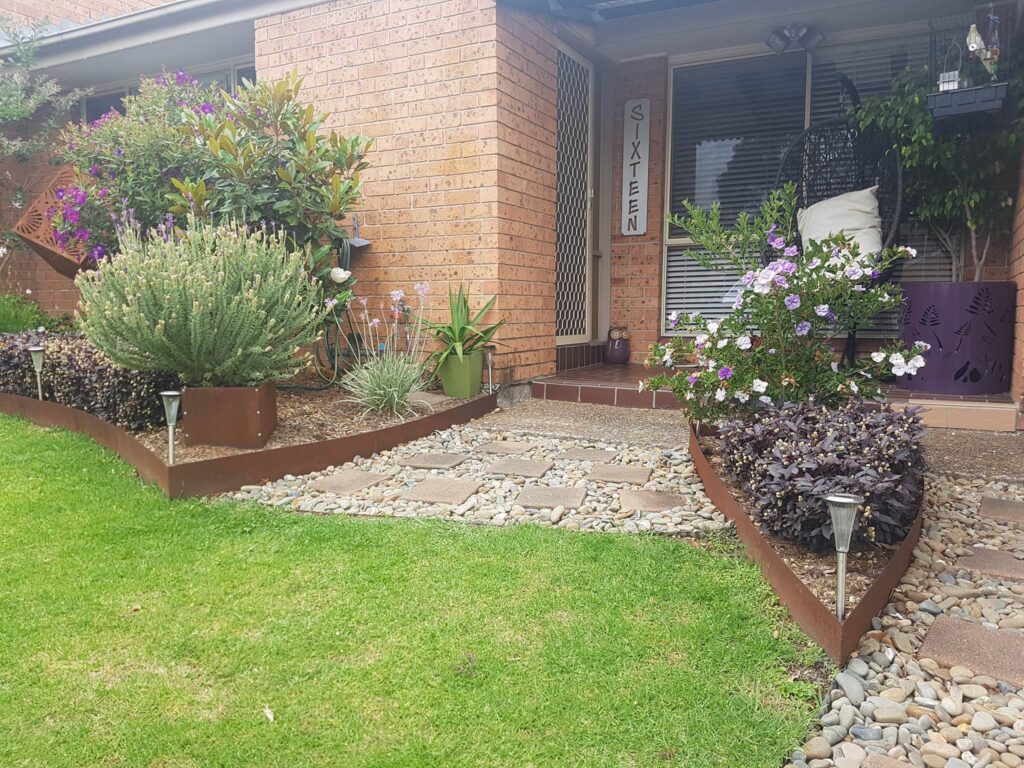 rusted corten steel metal garden bed edging