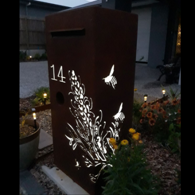 3D Grevillea Letterbox in Rusted Corten Steel with Perspex Backing 3D Grevillea Letterbox with Bees in Rusted Steel with Perspex