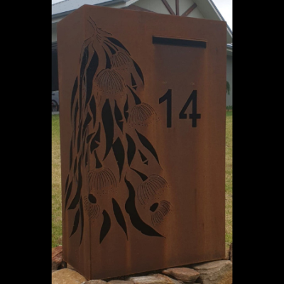 Wide Form Letterbox with Gum Leaf Cascade in Rusted Corten Steel- Wongawilli Wide Form Letterbox with Gum Leaf Cascade in Rusted Corten Steel- Wongawilli