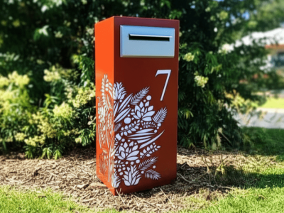 unique Custom Metal Free standing letterbox with Parcel mailbox in Powder coated aluminium. Floral pattern. Silver face plate.