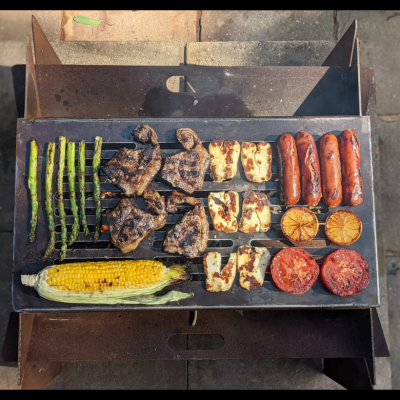 Collapsible Fire Pit with Grill Plate in Rusted Steel Collapsible portable Fire Pit with BBQ Grill for cooking when camping