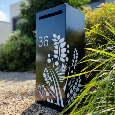 Medium Letterbox in Powder Coated Aluminium with Tropical Pattern and Perspex Medium Letterbox in Powder Coated Aluminium with Tropical Pattern and Perspex