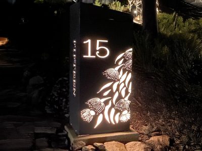 Standard free standing Letterbox in Powder coated aluminium. unique Gum Leaf Cascade pattern.