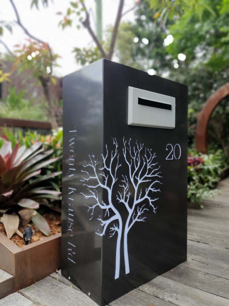 Custom Metal Free standing Parcel Letterbox in Powder coated aluminium . Autumn Tree pattern. & Silver face plate.