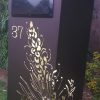 Standard Letterbox in Powder coated aluminium. Grevillea pattern. Black face plate.