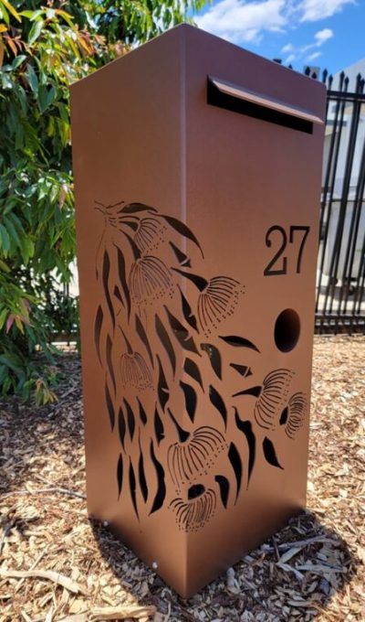 Medium LB Gumleaf Cascade - Sable Corten side view Medium Letterbox in Powder Coated aluminium. Gum leaf cascade pattern.