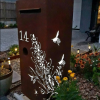 Standard Letterbox in Cor-Ten steel. Grevillea with bees pattern.