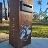 Standard Letterbox in Cor-Ten steel. Figtree pattern. Perspex & Black face plate.