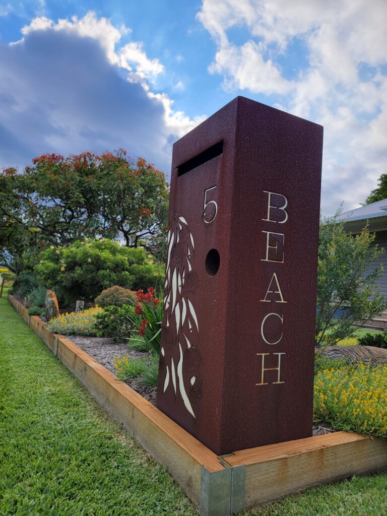 Medium Letterbox in Cor-Ten steel. Grevillea pattern.