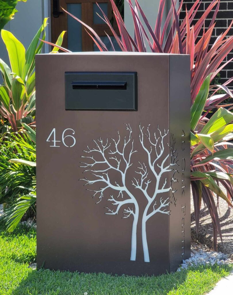 Custom Metal Free standing Parcel Letterbox in Powder coated aluminium . Autumn Tree pattern. & Black face plate.