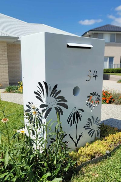 WF LB - Daisies Dulux Pearl White, Horsley Custom Metal Free standing Parcel Letterbox in Powder coated aluminium . Daisy pattern.
