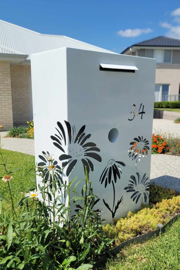 Custom Metal Free standing Parcel Letterbox in Powder coated aluminium . Daisy pattern.