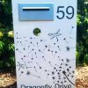 Custom Metal Free standing Parcel Letterbox in Powder coated aluminium . Dandelion Breeze & dragonfly pattern. & Silver face plate.