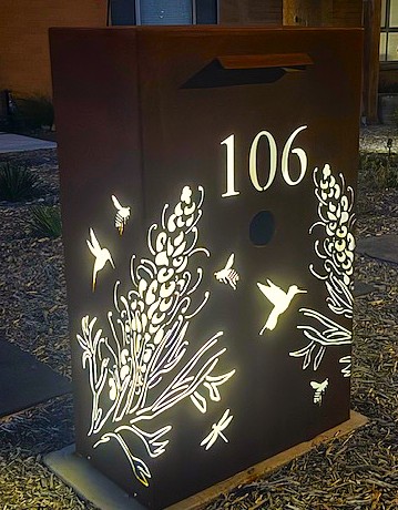 Custom Metal Free standing Parcel Letterbox in Corten Steel. Grevillea with Honey eater pattern. Perspex.
